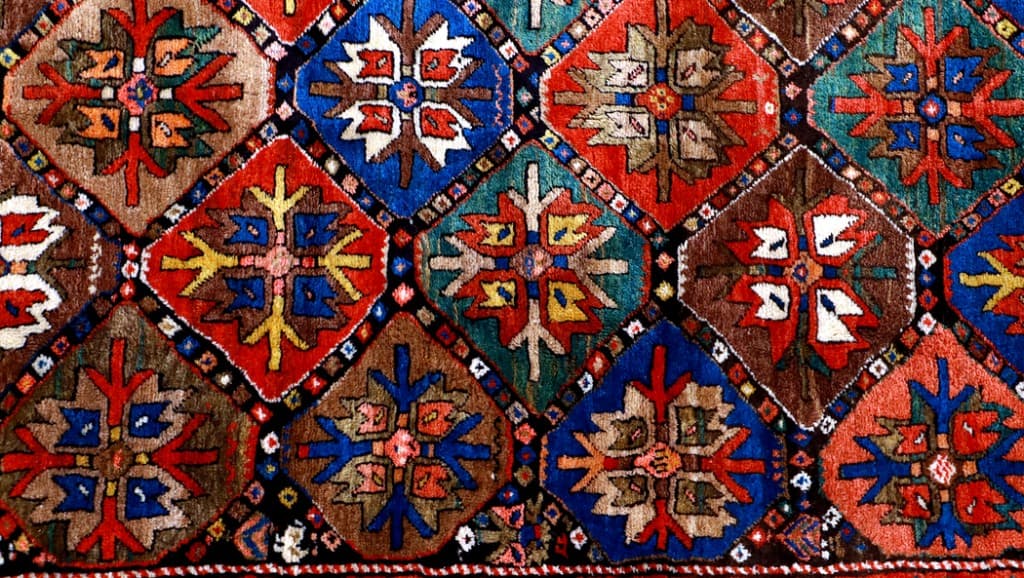 Colorful handmade Caucasian carpet detail